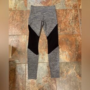 Women’s Forever 21 black and grey leggings - size small - with mesh cutouts